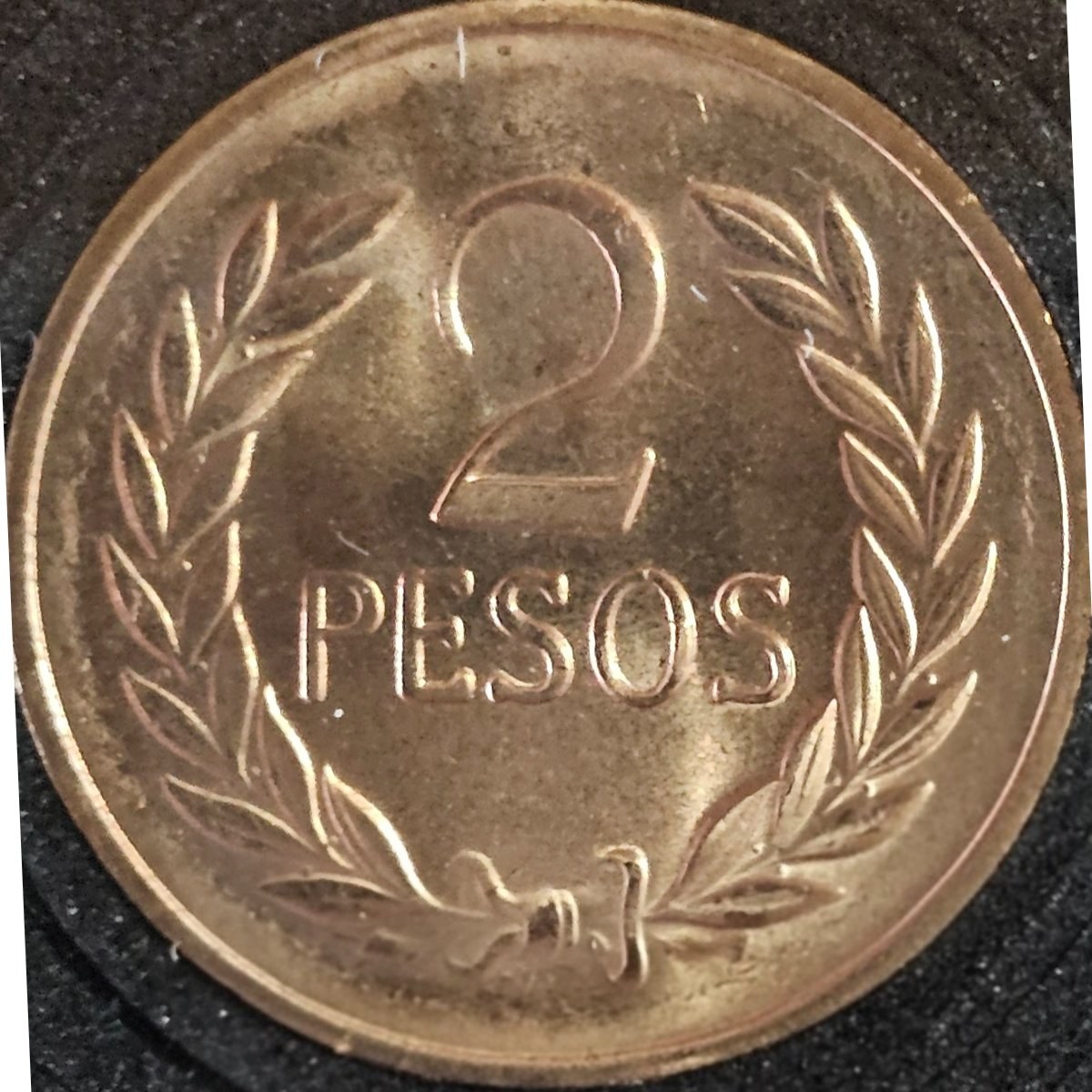 Anverso de 2 pesos, foto de Colección propia (Foto propia)